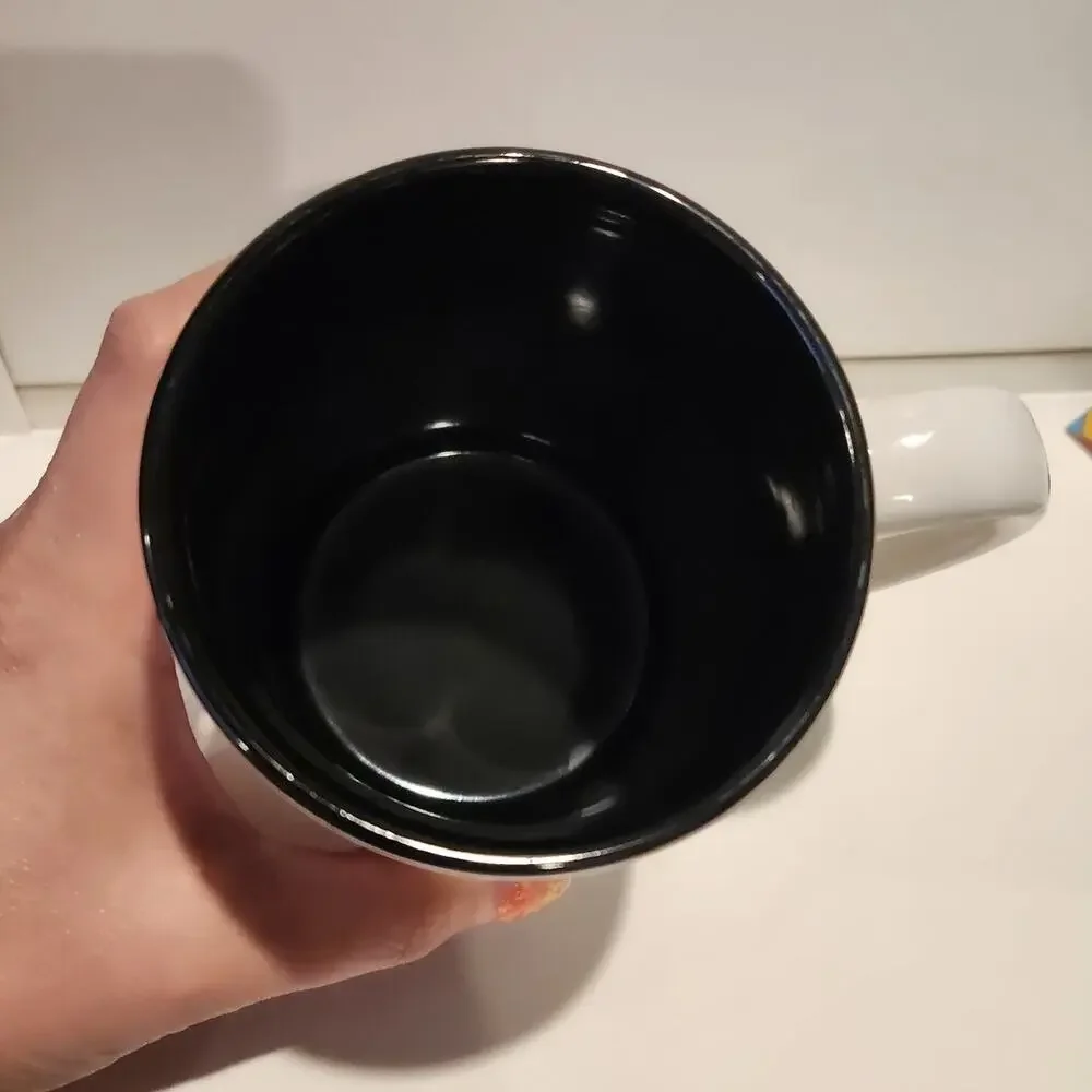 The Bell of Hope mug Degrazia black interior